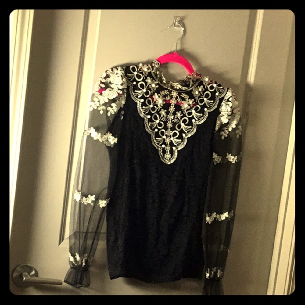 Black lace blouse with gold floral embroidery